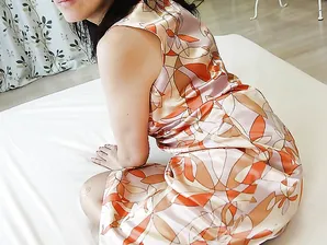 Asian MILF Shinobu Yabe undressing and exposing her cunt in close up