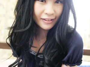 Adorable Japanese girl Mizutama Remon engages in POV sex upon a bed