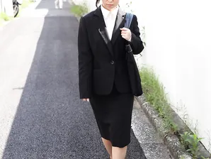 Japanese businesswoman Yuka Tsubasa gives an intense footjob & handjob