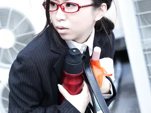 Japanese businesswoman Yuka Tsubasa gives an intense footjob & handjob