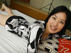 Frisky asian MILF Misuzu Okazaki undressing and spreading her pussy lips