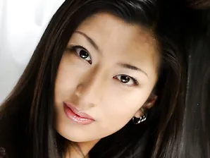 Japanese girl Ran Asakawa removes white bra and panties by an open window