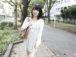 Japanese girl Madoka Adachi shows her bare legs during non-nude outdoor action