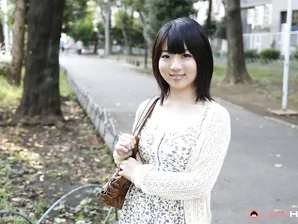 Japanese girl Madoka Adachi shows her bare legs during non-nude outdoor action