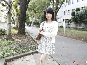 Japanese girl Madoka Adachi shows her bare legs during non-nude outdoor action