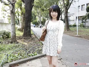 Japanese girl Madoka Adachi shows her bare legs during non-nude outdoor action