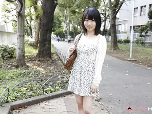 Japanese girl Madoka Adachi shows her bare legs during non-nude outdoor action