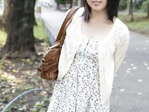 Japanese girl Madoka Adachi shows her bare legs during non-nude outdoor action