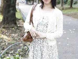 Japanese girl Madoka Adachi shows her bare legs during non-nude outdoor action