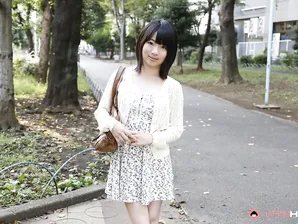 Japanese girl Madoka Adachi shows her bare legs during non-nude outdoor action