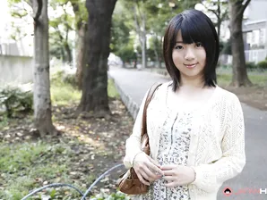 Japanese girl Madoka Adachi shows her bare legs during non-nude outdoor action
