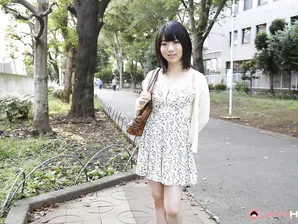 Japanese girl Madoka Adachi shows her bare legs during non-nude outdoor action