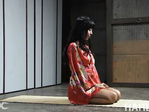 Beautiful Asian girl Marica Hase is suspended by ropes with red toenails