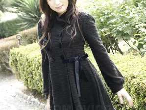 Fully clothed Japanese teen models in the park in black clothes and stockings