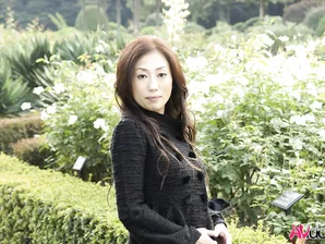 Fully clothed Japanese teen models in the park in black clothes and stockings