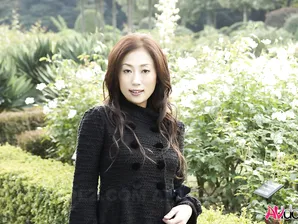 Fully clothed Japanese teen models in the park in black clothes and stockings