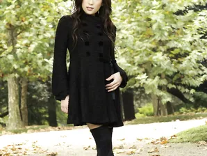 Fully clothed Japanese teen models in the park in black clothes and stockings