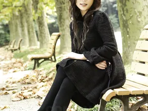 Fully clothed Japanese teen models in the park in black clothes and stockings