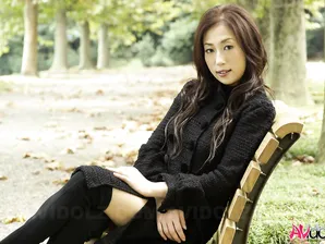 Fully clothed Japanese teen models in the park in black clothes and stockings