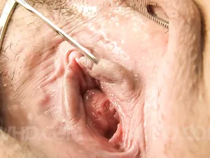 Big titted Japanese woman Yume Sazanami spreads her vagina with scissors