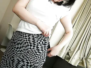 Asian MILF Misuzu Masuko undressing and spreading her pussy lips in close up