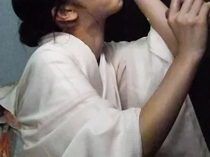 Japanese woman Marika licks jizz from a wrist to conclude a CFNM blowjob