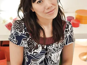 Nasty mature brunette milf Yoshie undressing her pretty body