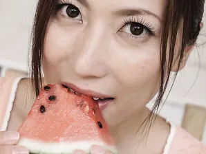 Japanese MILF Mirei Yokoyama eats watermelon before licking a cock