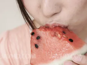 Japanese MILF Mirei Yokoyama eats watermelon before licking a cock