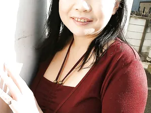 Sassy asian MILF Rumiko Shiga gets naked and has some pussy toying fun