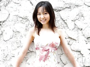 Sweet Japanese teen Yui Hasumi wears a smile while showing her hairy bush