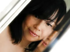 Asian MILF Norie Shibamura undressing and spreading her hairy lower lips