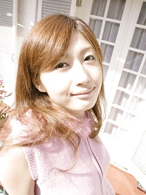 Asian solo girl Mio Komori hides her naked pussy behind a well-placed pear