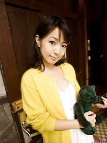 Japanese girl Nana Nanami pulls down cotton panties to show her bush