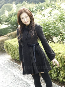 Fully clothed Japanese teen models in the park in black clothes and stockings